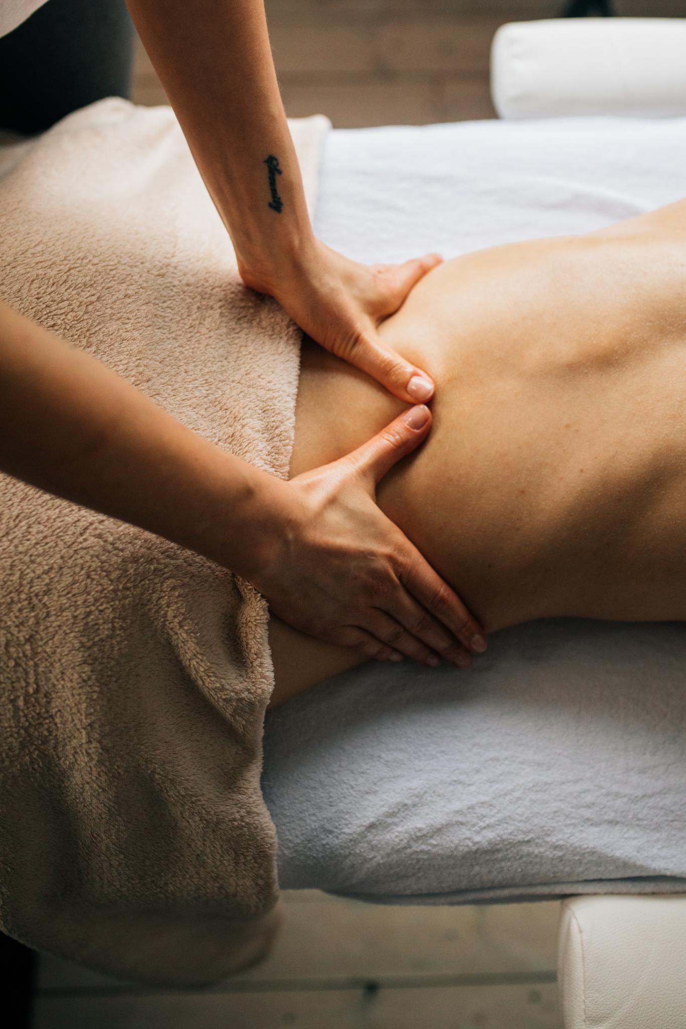 Experience relaxation with a soothing massage in a comfortable indoor setting, perfect for self-care and stress relief.